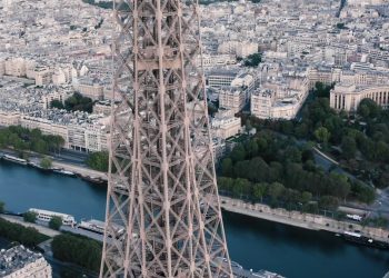 What Cultural Customs Surround the Eiffel Tower, and How Do They Shape the Visitor Experience?