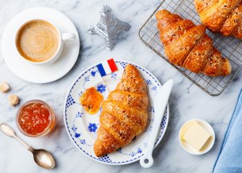 What Culinary Delights Await You at the Eiffel Tower, and How Do They Reflect Parisian Cuisine?